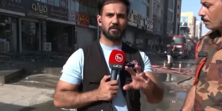 قوة امنية تمنع مراسل تلفزيوني من تغطية حريق في بغداد